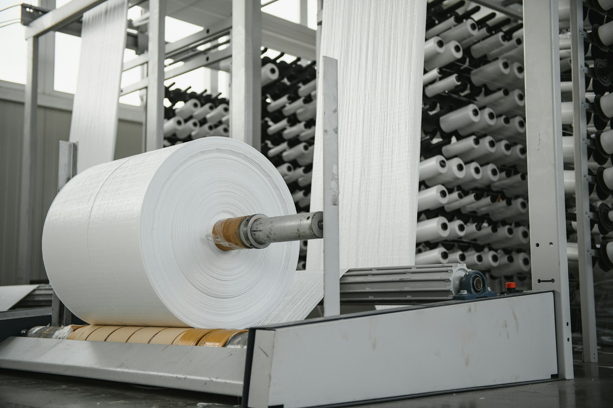roll of white fabric for cutting